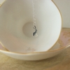sterling silver hare necklace in a tea cup - home of juniper