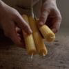 beeswax candles in hand