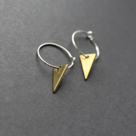 thin silver hoop earrings with brass triangle charm